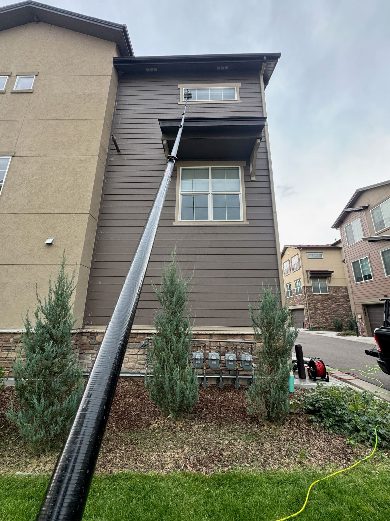 Reaching New Heights: Expert Use of Water Fed Pole image